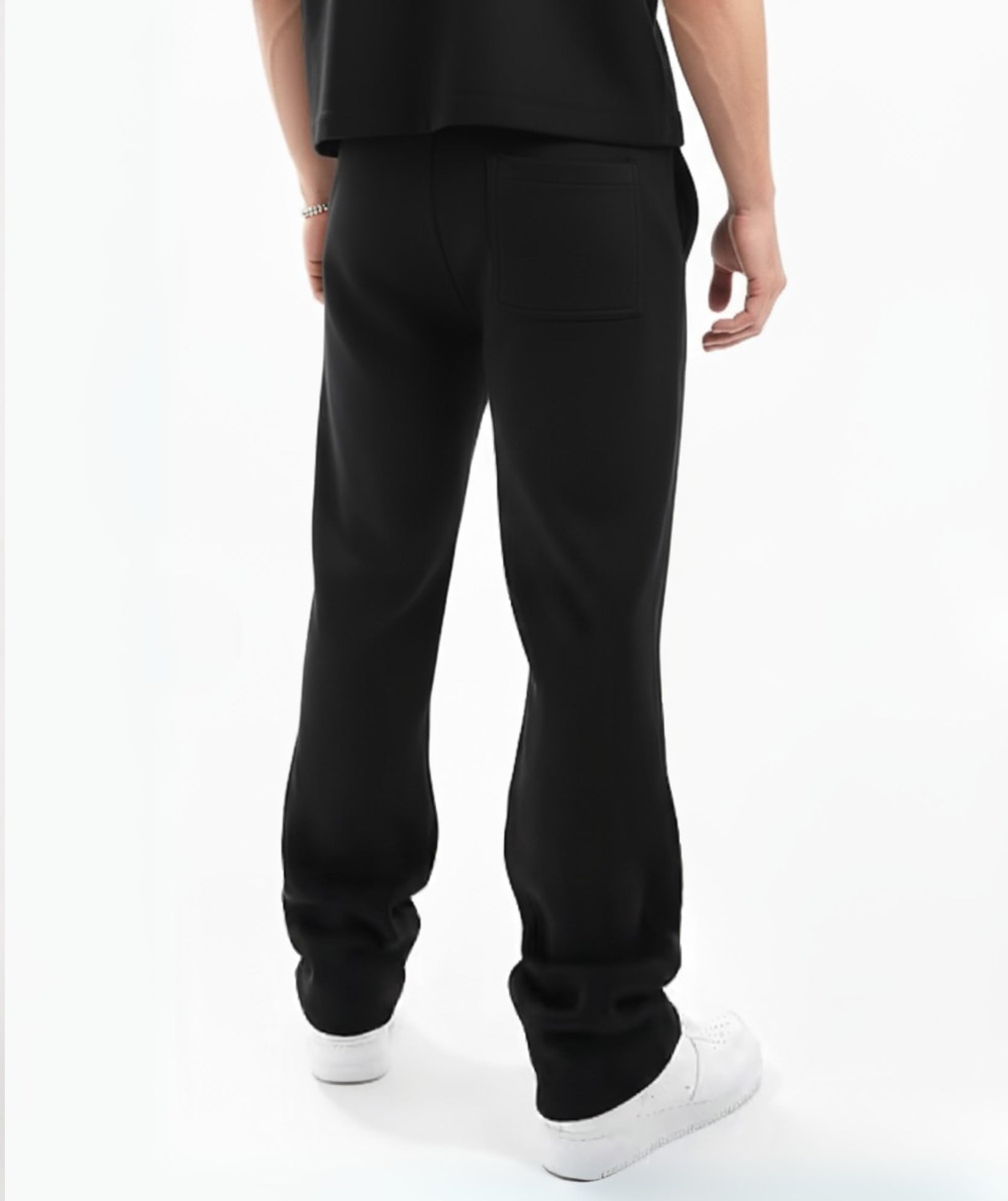 Black Terry Cotton Sweatpants. Featuring a modern straight-leg fit, three functional pockets, and ultra-soft fabric. Your new wardrobe staple.