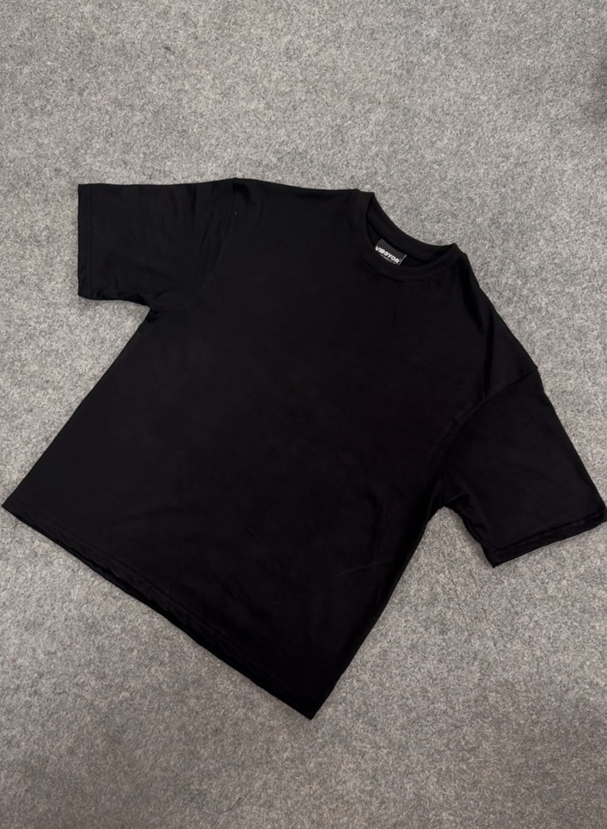 Oversized boxy tee in Black - Pakistan