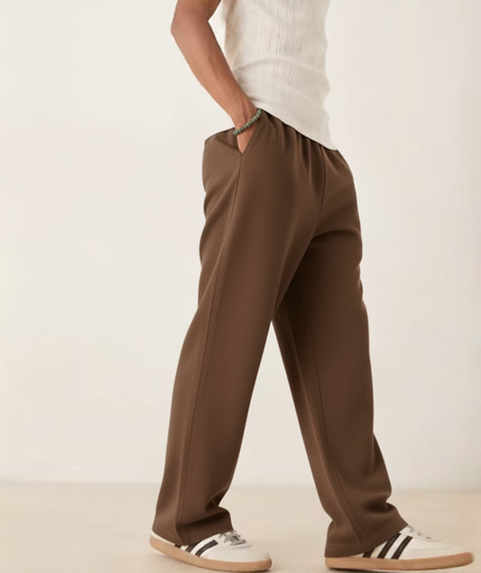 Brown Terry Cotton Sweatpants. Featuring a stylish straight-leg fit, three pockets, and premium soft fabric. Shop the perfect modern neutral.