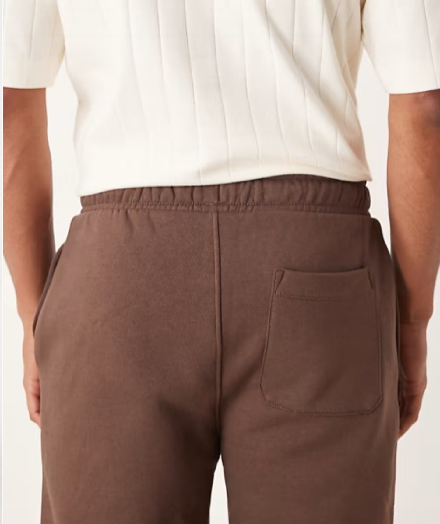 Brown Terry Cotton Sweatpants. Featuring a stylish straight-leg fit, three pockets, and premium soft fabric. Shop the perfect modern neutral.