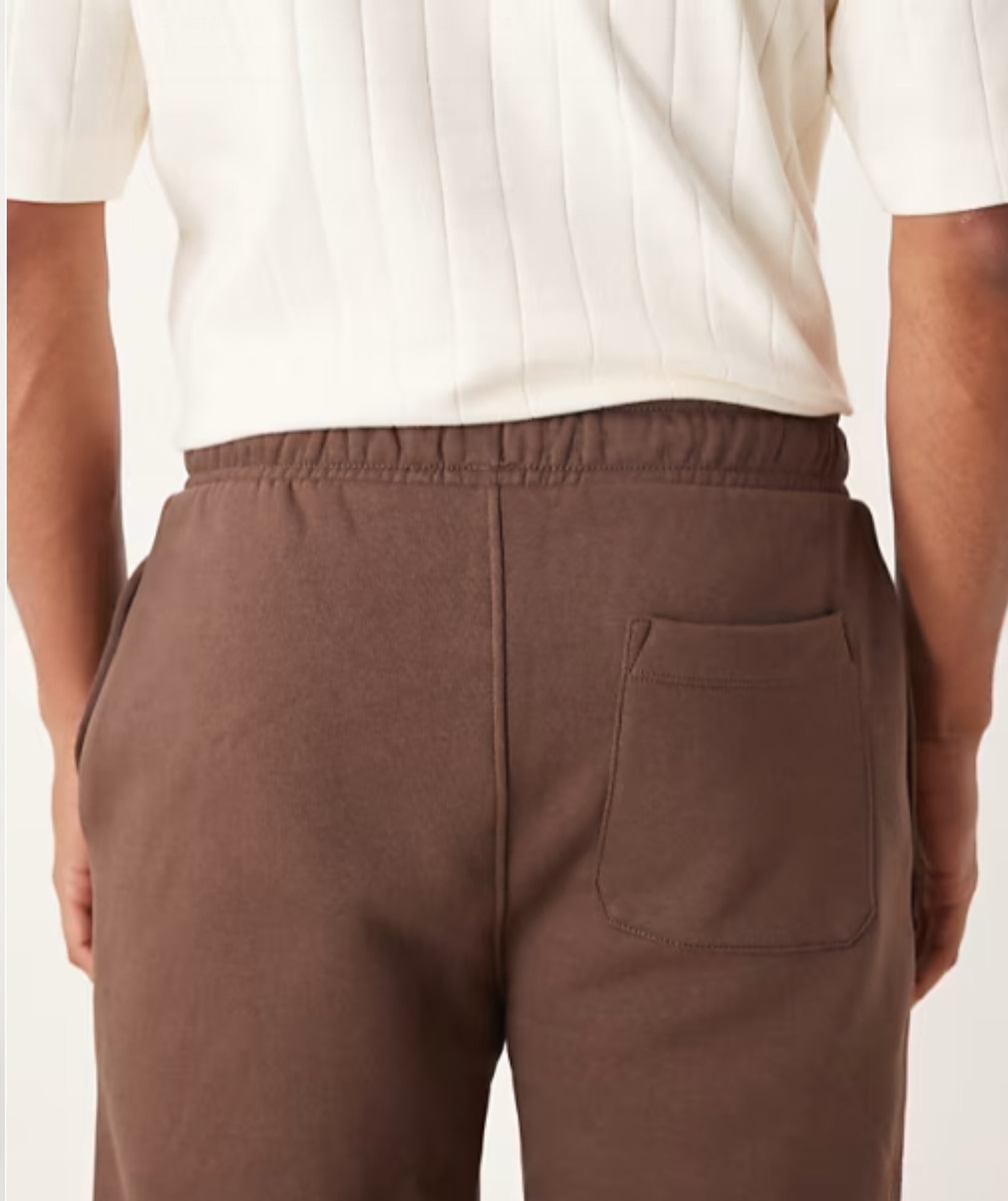 Brown Terry Cotton Sweatpants. Featuring a stylish straight-leg fit, three pockets, and premium soft fabric. Shop the perfect modern neutral.