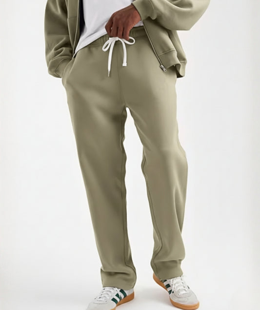 Light Olive Terry Cotton Sweatpants. Designed with a modern straight-leg fit, three pockets, and ultra-soft fabric. The perfect unique neutral.
