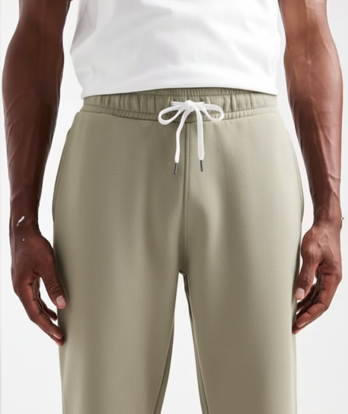 Light Olive Terry Cotton Sweatpants. Designed with a modern straight-leg fit, three pockets, and ultra-soft fabric. The perfect unique neutral.