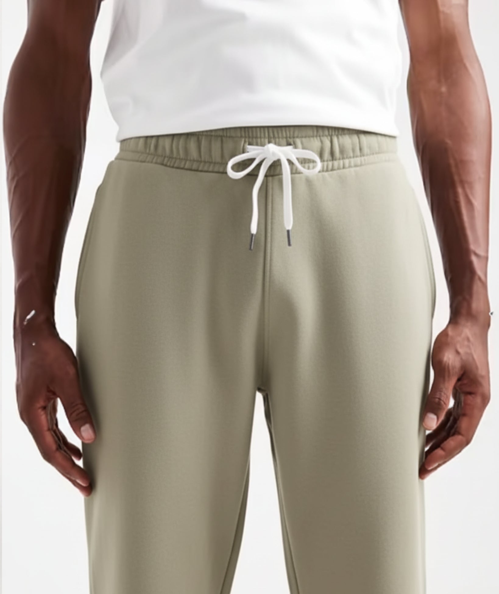 Light Olive Terry Cotton Sweatpants. Designed with a modern straight-leg fit, three pockets, and ultra-soft fabric. The perfect unique neutral.