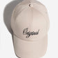 Beige Cap with Óriginal (Black) Embroidery
